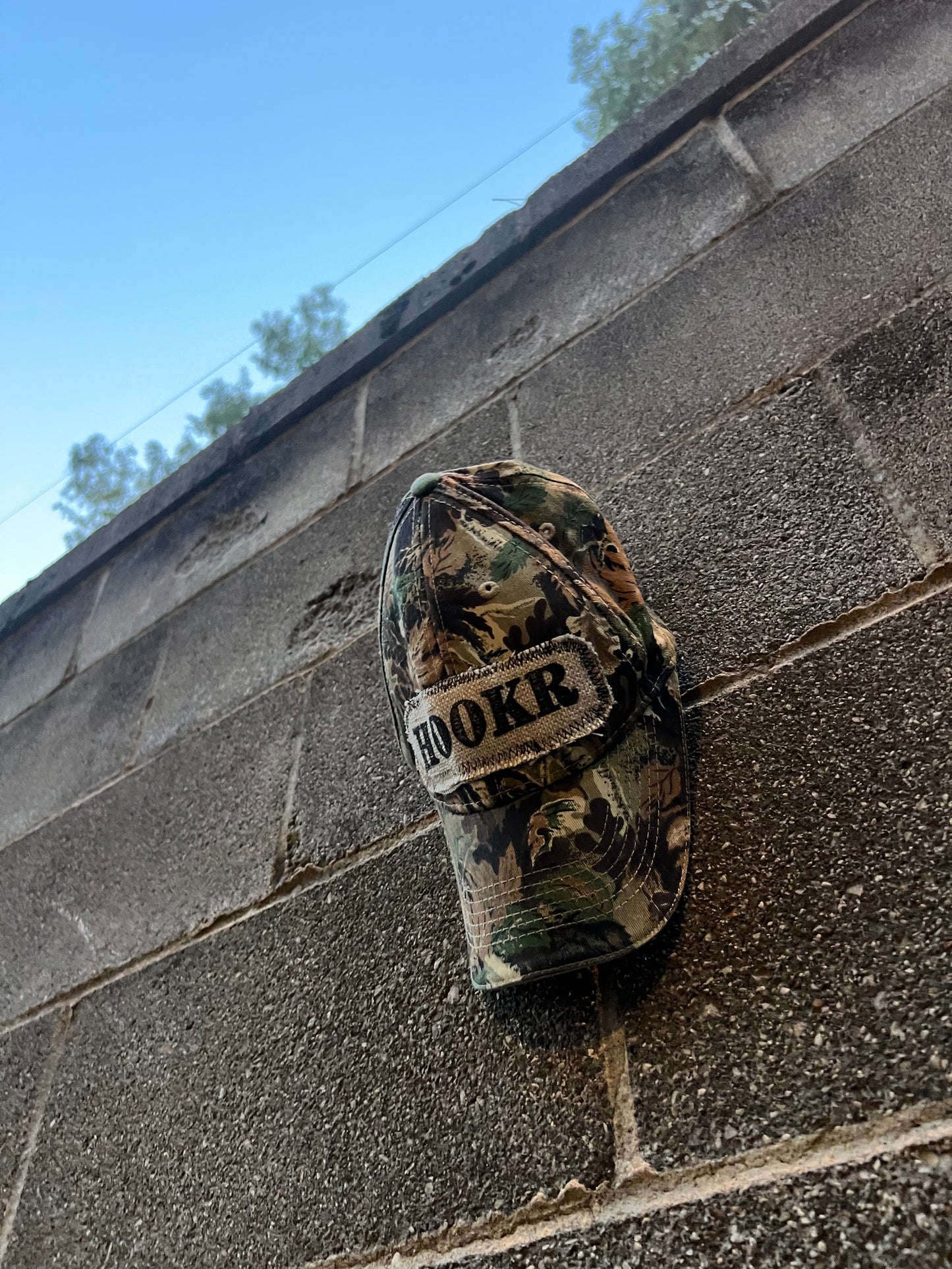 hookr merch - camo hat